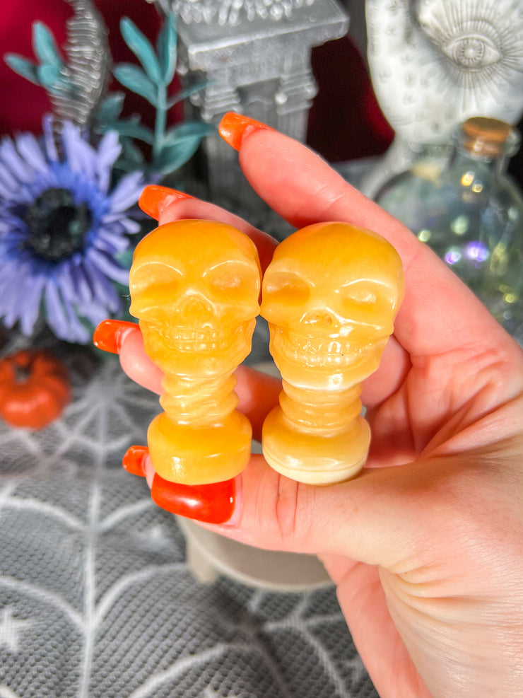 Orange Calcite Skull w/ Neck on Stand