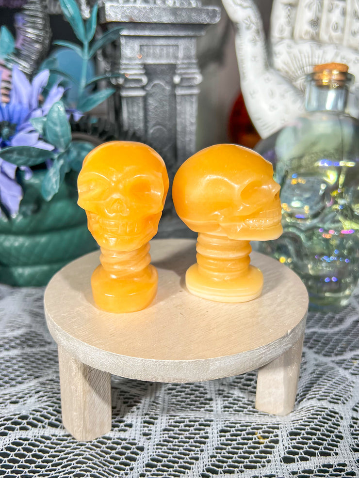 Orange Calcite Skull w/ Neck on Stand